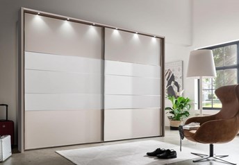 Champagne matt frame & doors, white matt mid panels, passepartout frame & spotlights.