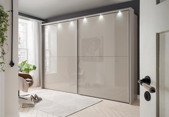 Champagne matt carcass with champagne glass doors, external frame with lights, with silver handles