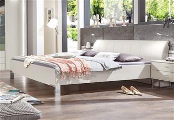 Champagne frame and faux leather headboard