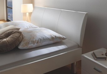 Ripo headboard on offer, white real leather