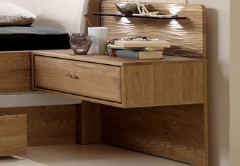 detail of 1 drawer bedside table with wave-textured back panel - default (also available plain, non textured) glass shelf and LED lights