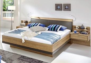 Version with synthetic leather headboard in havanna, bedframe perimeter trim in havanna matt