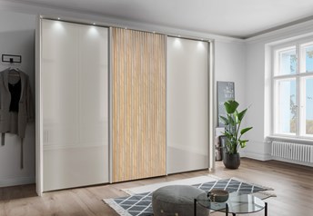 Champagne carcass and middle door, champagne glass outer doors, decking bianco oak, pp frame with spotlights