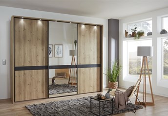 bianco oak carcass and outer doors, middle mirror, SLATE cross trim, and handles, passe partout frame with spotlights