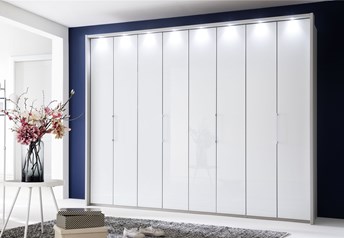wardrobes shown in pictures are all 300 cm wardrobes - white carcass with white glass doors, and  LED spotlights on passe partout frame.